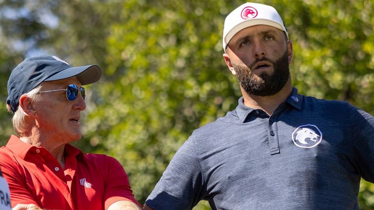 (L-R) Caddie Adam Hayes, LIV Golf CEO, Greg Norman and Jon Rahm of Legion XIII GC talk on the first tee during the first round of the LIV Golf Mayakoba at the El Camale..n Golf Course on Friday, February 02, 2024 in Playa del Carmen, Mexico. (Photo by Chris Trotman/LIV Golf via AP)