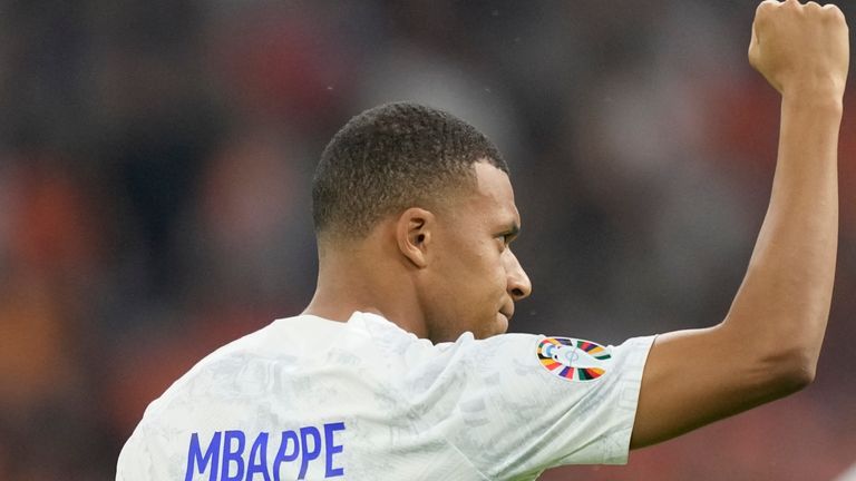 France's Kylian Mbappe celebrates after scoring his side's opening goal during the Euro 2024 group B qualifying soccer match between The Netherlands and France at the Johan Cruyff ArenA stadium in Amsterdam, Netherlands, Friday, Oct. 13, 2023. (AP Photo/Peter Dejong)