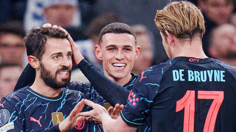 Bernardo Silva celebrates scoring Man City's second with Phil Foden and Kevin De Bruyne