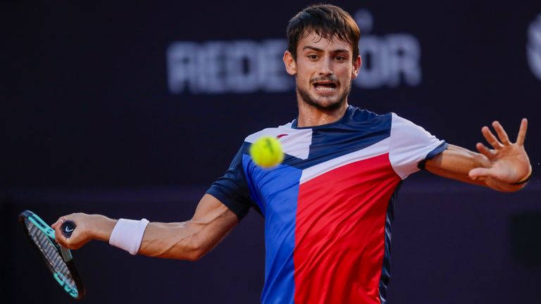 Mariano Navone prepares to hit a return shot against Sebastian Baez, both of Argentina, during the final match of the Rio Open tennis tournament in Rio de Janeiro, Brazil, Sunday, Feb. 25, 2024. (AP Photo/Bruna Prado)