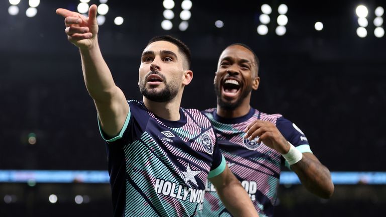 Neal Maupay celebrates after giving Brentford a first-half lead at Spurs