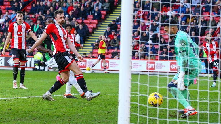 Jack Robinson scores an own goal to condemn Sheffield United to a 3-0 deficit against Brighton