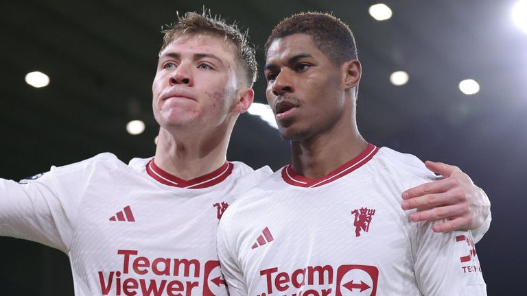 Goalscorers Rasmus Hojlund and Marcus Rashford celebrate at Molineux