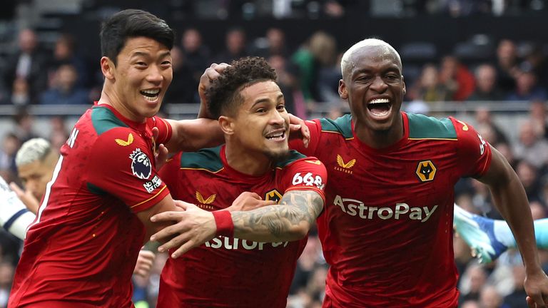 Joao Gomes celebrates after scoring for Wolves at Spurs