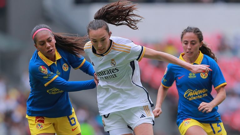 Caroline Weir, center, of Spain's Real Madrid fights for the ball against Noemi Granados, left, and Eva Gonzalez, right, of Mexico's America during a women's friendly soccer match at Azteca stadium in Mexico City, Sunday, Sept. 3, 2023. (AP Photo/Elizabeth Ruiz Ruiz)