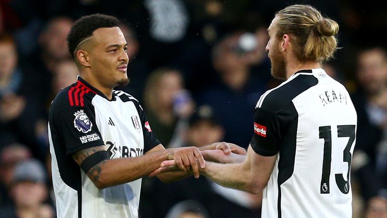 Rodrigo Muniz of Fulham celebrates scoring his team's third goal with team-mate Tim Ream