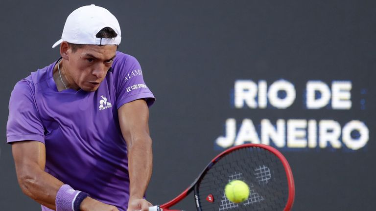 Sebastian Baez returns the ball to Mariano Navone, both of Argentina, during the final match of the Rio Open tennis tournament in Rio de Janeiro, Brazil, Sunday, Feb. 25, 2024. (AP Photo/Bruna Prado)