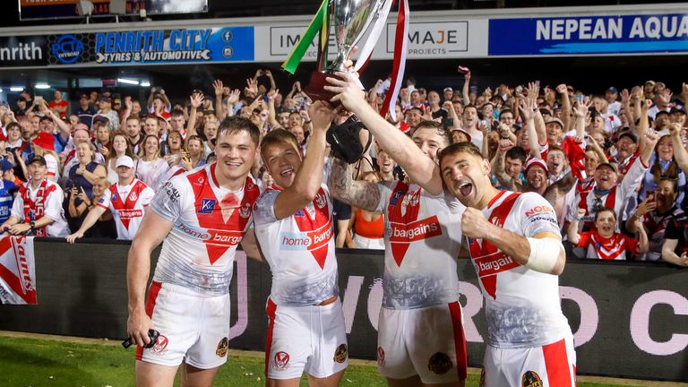 Picture by David Neilson/SWpix.com - 18/02/2023 - Rugby League - World Club Challenge - Penrith Panthers v St Helens - The BlueBet Stadium, Penrith, Australia - St Helens' Jack Welsby, Jonny Lomax, Mark Percival & Tommy Makinson with the World Club Challenge trophy