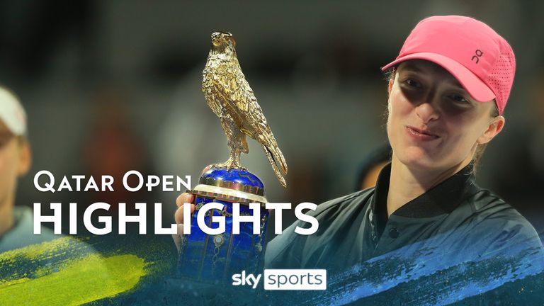 Poland&#39;s Iga Swiatek holds the trophy after winning the Qatar Open final against Kazakhstan&#39;s Ekaterina Rybakina in Doha, Qatar, on Saturday, Feb. 17, 2024.