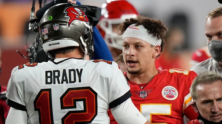 Tampa Bay Buccaneers quarterback Tom Brady speaks with Kansas City Chiefs quarterback Patrick Mahomes after the NFL Super Bowl