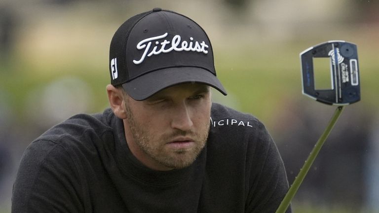 Wyndham Clark lines his putt on the 18th green at Pebble Beach Golf Links during the third round of the AT&T Pebble Beach National Pro-Am golf tournament in Pebble Beach, Calif., Saturday, Feb. 3, 2024. (AP Photo/Ryan Sun)