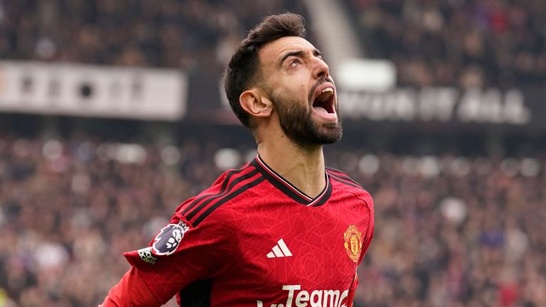 Bruno Fernandes celebrates after scoring the opening goal with a first-half penalty