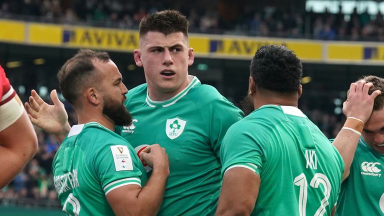 Ireland's Dan Sheehan (centre) celebrates with team-mates after scoring their side's first try