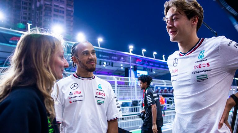 JEDDAH STREET CIRCUIT, SAUDI ARABIA - MARCH 06: Doriane Pin (FRA, Prema Racing), Sir Lewis Hamilton, Mercedes-AMG F1 Team, and George Russell, Mercedes-AMG F1 Team during the Saudi Arabian GP at Jeddah Street Circuit on Wednesday March 06, 2024 in Jeddah, Saudi Arabia. (Photo by Sam Bloxham / LAT Images)