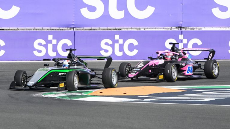 JEDDAH STREET CIRCUIT, SAUDI ARABIA - MARCH 09: Doriane Pin (FRA, Prema Racing) leads Abbi Pulling (GBR, Rodin Motorsport) during the Jeddah at Jeddah Street Circuit on March 09, 2024 in Jeddah Street Circuit, Saudi Arabia. (Photo by Mark Sutton / Sutton Images)