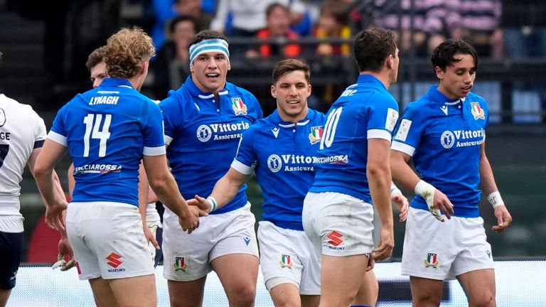 Italy's players celebrates a try