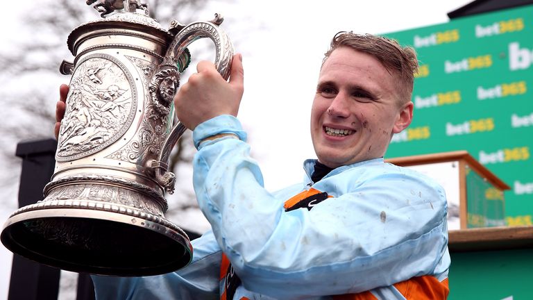 Jordan Nailor raising the trophy after winning the Midlands Grand National