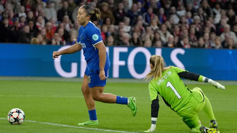 Chelsea's Lauren James scores her side's first goal past Ajax's Regina van Eijk during the Women's Champions League quarterfinal soccer match between Ajax and Chelsea at the Johan Cruyff ArenA, in Amsterdam, Netherlands, Tuesday, March 19, 2024. (AP Photo/Peter Dejong)