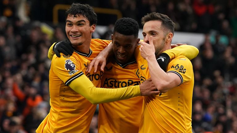 Nelson Semedo (centre) celebrates scoring their side's second goal of the game 