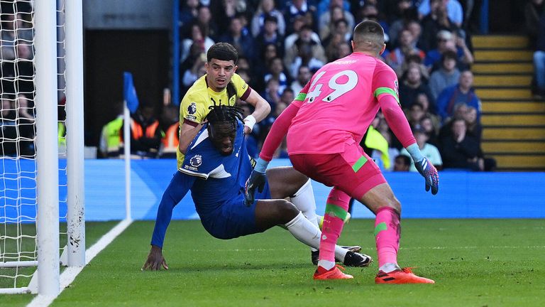 Axel Disasi bundles the ball into Burnley's net only for his effort to be ruled out by VAR for handball