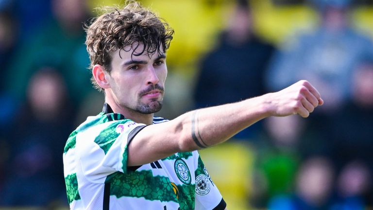 Matt O'Riley celebrates after scoring Celtic's third goal at Livingston