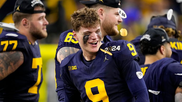 Michigan quarterback J.J. McCarthy celebrates their win against Washington in the national championship