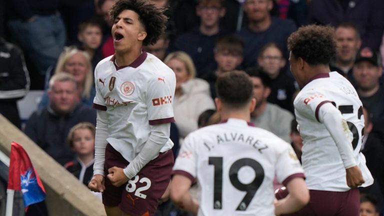 Manchester City's Rico Lewis celebrates after scoring his side's second goal