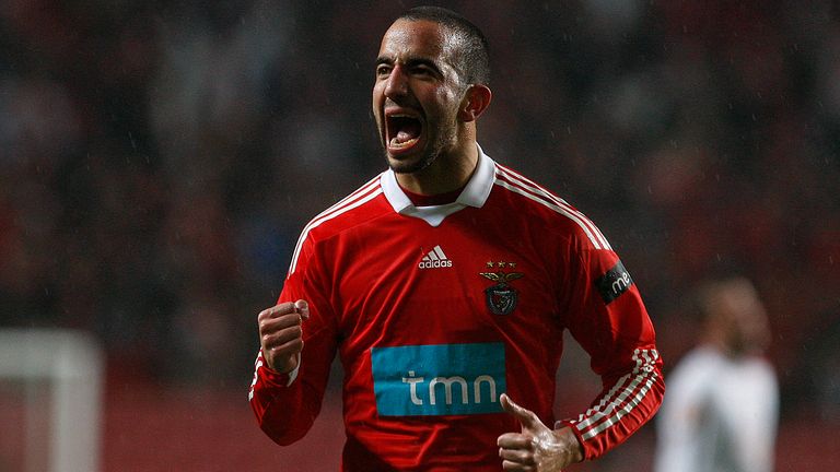 Benfica's Ruben Amorim celebrates after scoring their third goal during their Portuguese league soccer match with Leiria on Wednesday, Feb. 3 2010, at Benfica's Luz stadium in Lisbon.