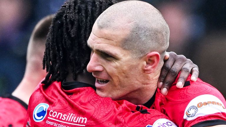 DUNDEE, SCOTLAND - MAY 04: Alex Gogic celebrates with Toyosi Olusanya after scoring to make it 1-0 St Mirren during a cinch Premiership match between Dundee and St Mirren at the Scot Foam Stadium Dens Park, on May 04, 2024, in Dundee, Scotland. (Photo by Paul Devlin / SNS Group)