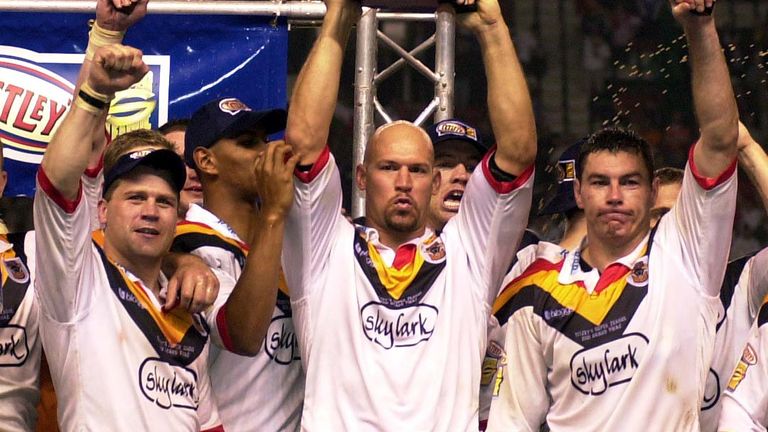 Picture by Ben Duffy/SWpix.com - 13/10/2001 - Rugby League - Tetleys Super League Grand Final - Wigan Warriors v Bradford Bulls - Old Trafford, Manchester, England - Bradford's James Lowes, Graham Mackay and Michael Withers celebrate victory over Wigan in the Grand Final