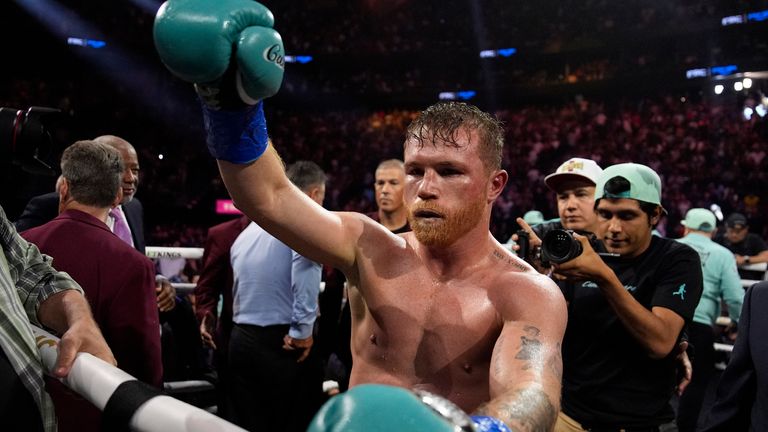 Canelo Alvarez celebrates after defeating Jaime Munguia in a super middleweight title fight Saturday, May 4, 2024, in Las Vegas. (AP Photo/John Locher)