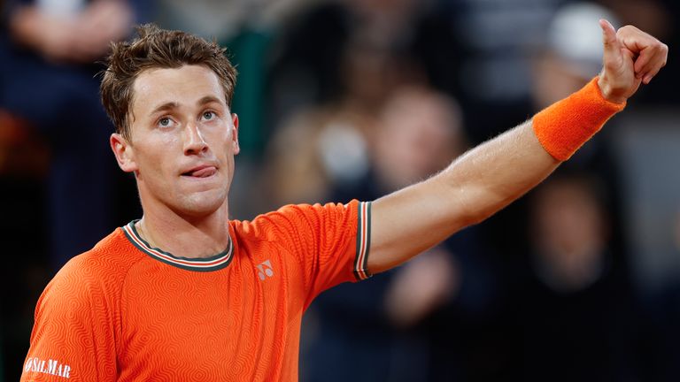 Norway's Casper Ruud celebrates winning against Brazil's Felipe Meligeni Alves at the end of their first round match of the French Open tennis tournament at the Roland Garros stadium in Paris, Tuesday, May 28, 2024. (AP Photo/Jean-Francois Badias)