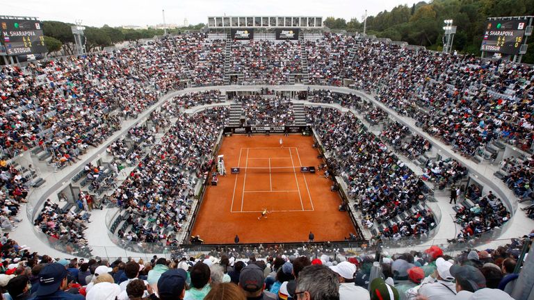 Spectators fill the stands of the central court at the Rome Foro Italico center, Sunday, May 15, 2011, during the women's final at the Italian Open tennis tournament. Maria Sharapova stormed to a 6-2, 6-4 win over Sam Stosur in the Italian Open final Sunday for the biggest clay-court title of her career. (AP Photo/Riccardo De Luca)