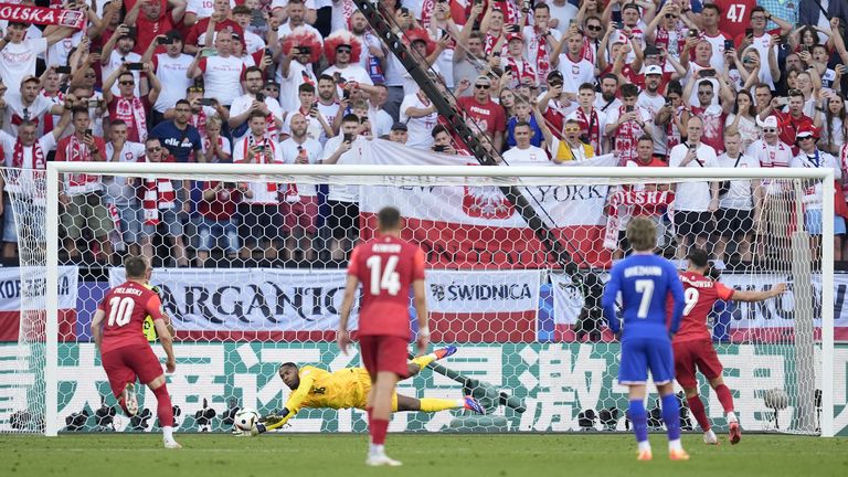 Poland got a penalty but Mike Maignan saved Robert Lewandowski's first effort