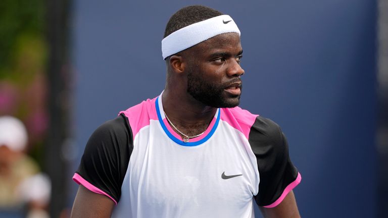 Frances Tiafoe walks on the court during his match against Christopher O'Connell, of Australia, at the Miami Open tennis tournament, Saturday, March 23, 2024, in Miami Gardens, Fla. (AP Photo/Lynne Sladky)