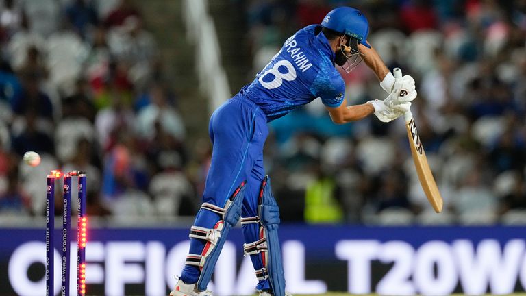 Afghanistan's Ibrahim Zadran is bowled by South Africa's Kagiso Rabada in T20 World Cup semi-final (Associated Press)