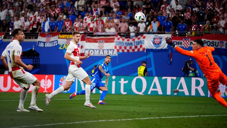 Italy's Mattia Zaccagni scores his side's opening goal during a Group B match between Croatia and Italy at the Euro 2024 soccer tournament in Leipzig, Germany, Monday, June 24, 2024. (AP Photo/Petr David Josek)