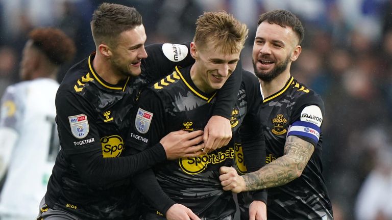 Flynn Downes celebrates after scoring Southampton's third goal against Swansea