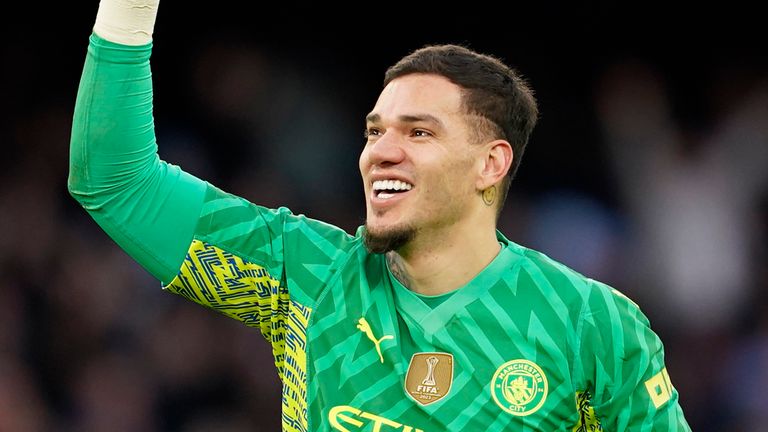 Manchester City's goalkeeper Ederson celebrates at the end of an English Premier League soccer match between Manchester City and Manchester United at the Etihad Stadium in Manchester, England, Sunday, March 3, 2024. (AP Photo/Dave Thompson)