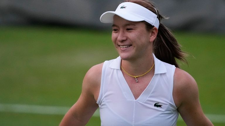 Lulu Sun of New Zealand reacts after defeating Yuliia Starodubtseva of Ukraine in their match on day three at the Wimbledon tennis championships in London, Wednesday, July 3, 2024. (AP Photo/Mosa'ab Elshamy)