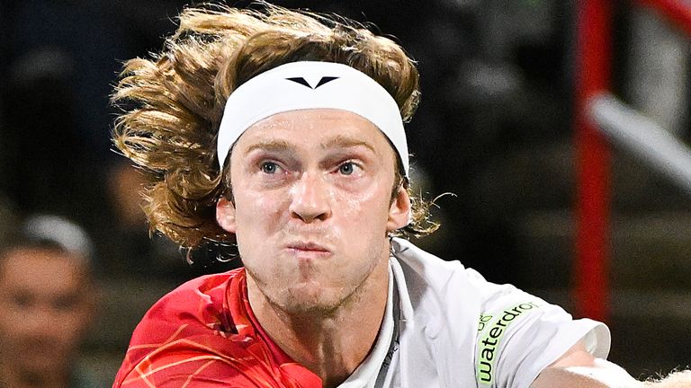 Andrey Rublev of Russia plays a shot to Jannik Sinner of Italy during their quarter-final match at the National Bank Open tennis tournament in Montreal, Saturday, August 10, 2024. (Graham Hughes/The Canadian Press via AP)