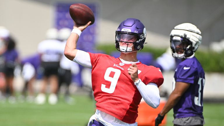 Minnesota Vikings quarterback J.J. McCarthy throws a pass during NFL football training camp in Eagan, Minn., Wednesday, July 24, 2024. (AP Photo/Craig Lassig)