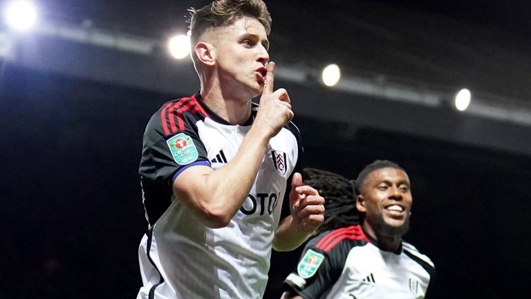 Tom Cairney celebrates scoring Fulham's third goal