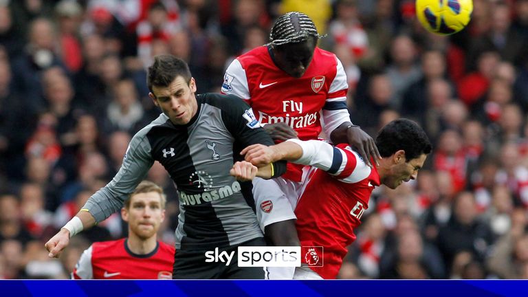 Arsenal&#39;s Bacary Sagna, center right, and Mikel Arteta, right, compete for the ball with Tottenham Hotspur&#39;s Gareth Bale, center left, during their English Premier League soccer match at Emirates stadium, London, Saturday, Nov. 17, 2012. (AP Photo/Sang Tan)


