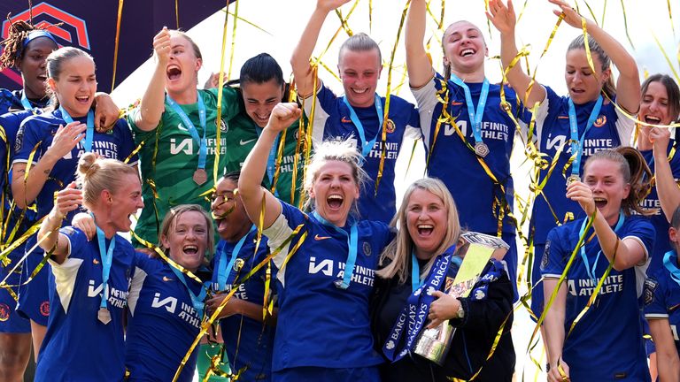 Chelsea manager Emma Hayes and Millie Bright celebrate with the WSL trophy