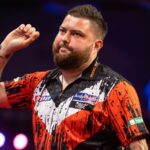 Hungarian Darts Trophy: Michael Smith beaten by Jonny Clayton on night one while Peter Wright and Raymond van Barneveld progress | Darts News