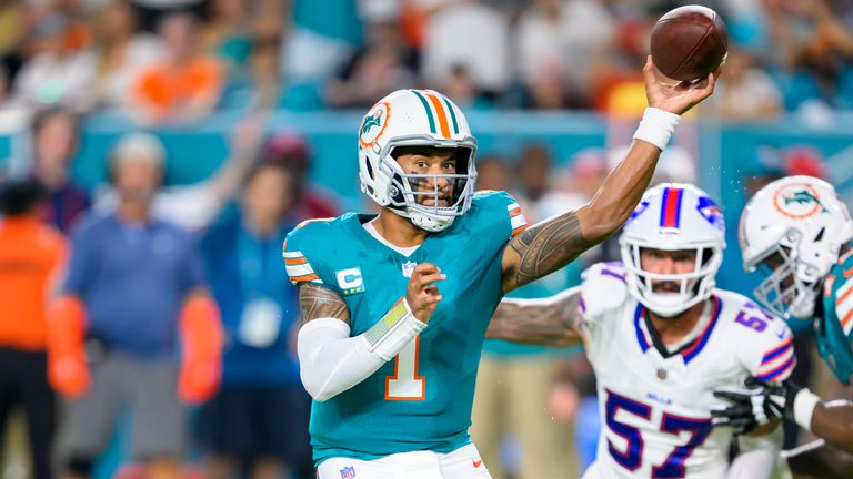 Miami Dolphins quarterback Tua Tagovailoa (1) throws the ball during an NFL football game against the Buffalo Bills, Thursday, Sept. 12, 2024, in Miami Gardens, Fla. (AP Photo/Doug Murray)