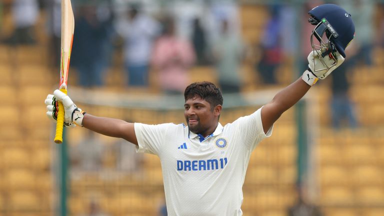 BENGALURU, INDIA - OCTOBER 19: Sarfaraz Khan of India celebrates scoring a century during day four of the First Test match between India and New Zealand at M. Chinnaswamy Stadium on October 19, 2024 in Bengaluru, India. (Photo by Abhishek Chinnappa/Getty Images)