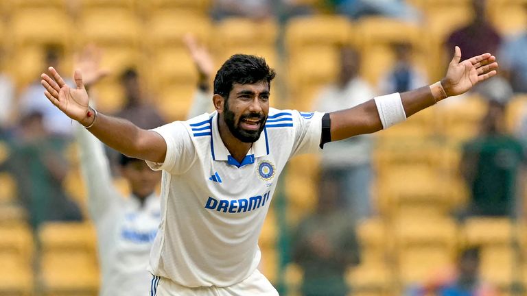 India's Jasprit Bumrah successfully appeals for leg before wicket (LBW) against New Zealand's Devon Conway during the fifth and final day of the first Test cricket match between India and New Zealand at the M. Chinnaswamy Stadium in Bengaluru on October 20, 2024. (Photo by IDREES MOHAMMED / AFP) / -- IMAGE RESTRICTED TO EDITORIAL USE - STRICTLY NO COMMERCIAL USE --