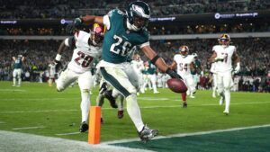 Read more about the article NFL 2024: Saquon Barkley scores two late touchdowns as Philadelphia Eagles defeat Washington Commanders 26-18 | NFL News